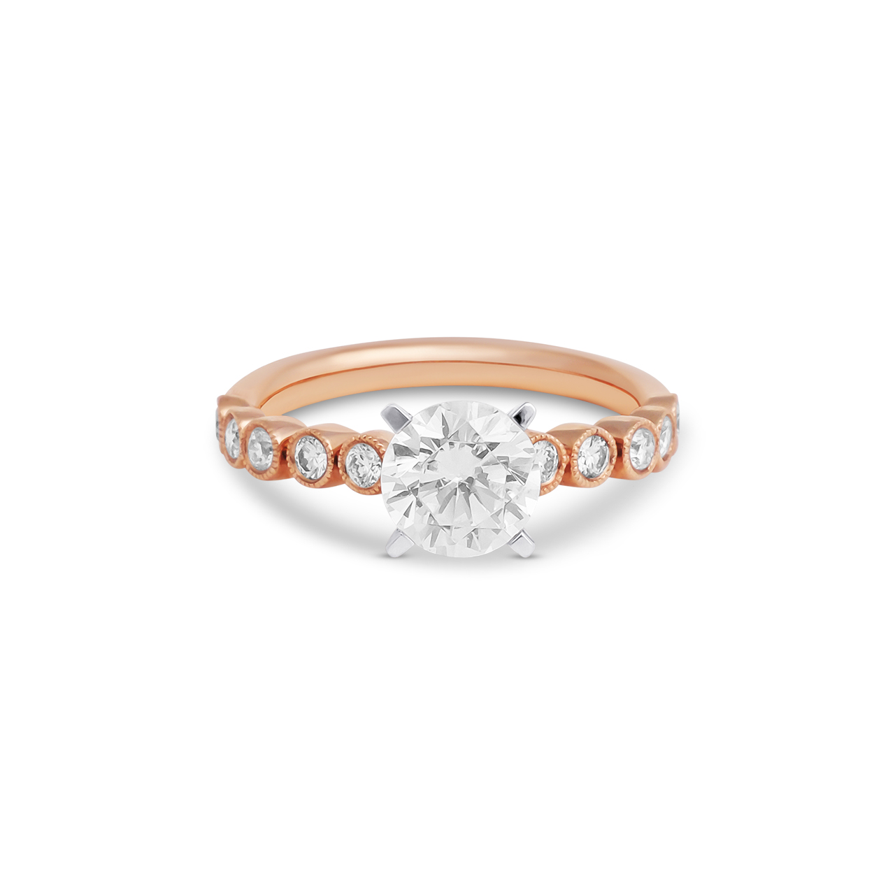 Rose gold ring with bezel-set diamonds